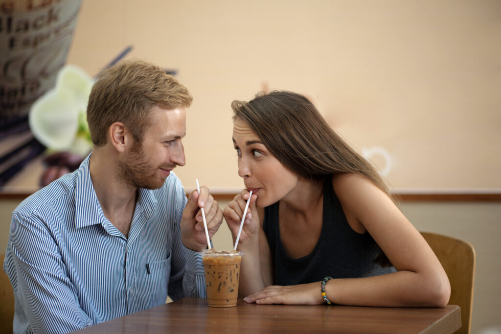 Sharing milkshake
